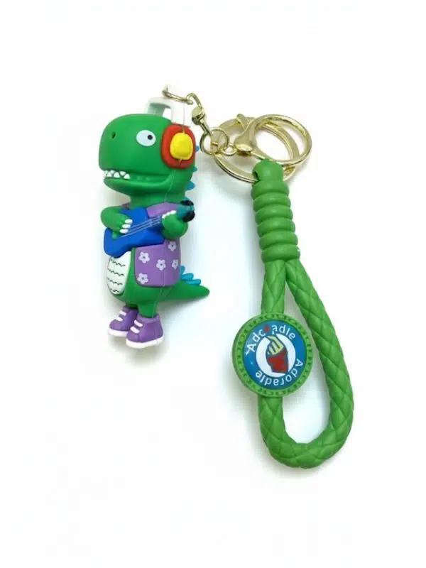 Yeşil Mutlu Dinazor Temalı Silikon Anahtarlık 